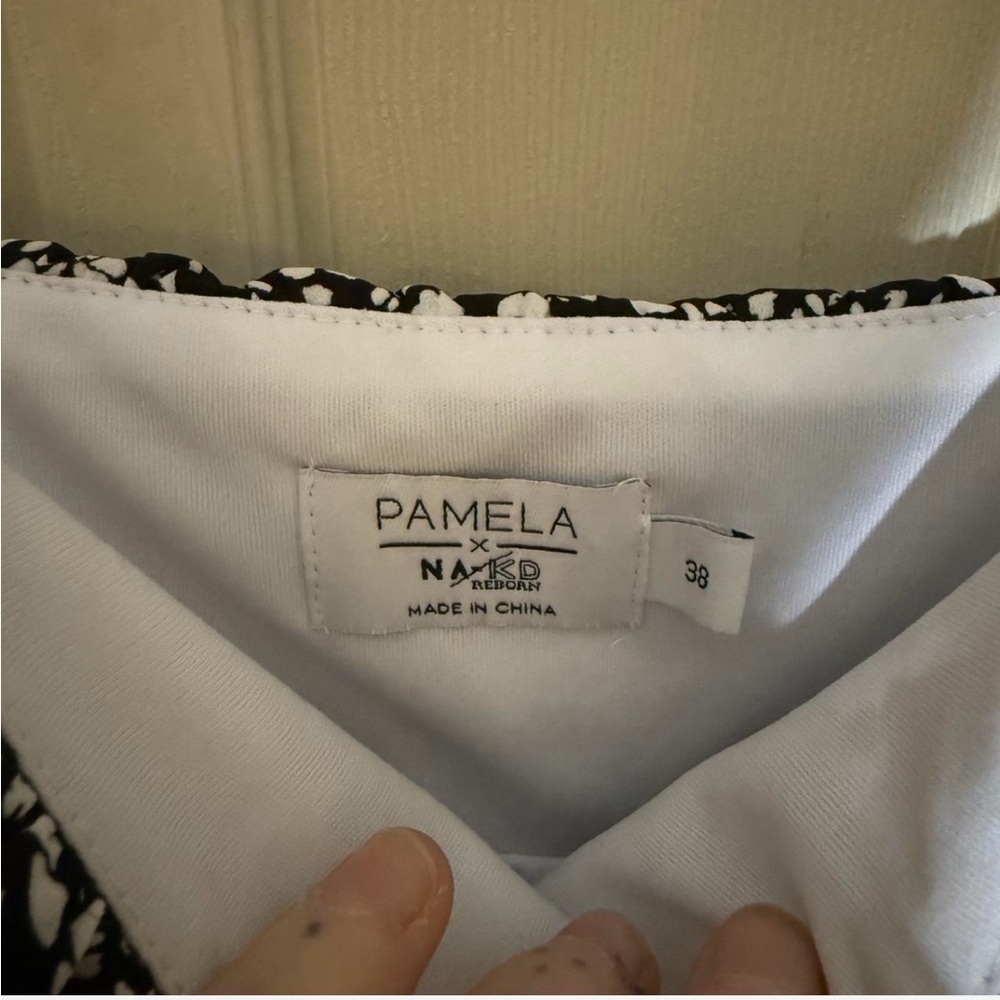 This is a Pamela X NA-KD ditsy floral black and white milkmaid summer dress - Picture 3 of 6